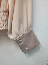 Blusa incrociata cipria