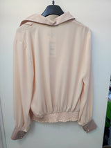 Blusa incrociata cipria
