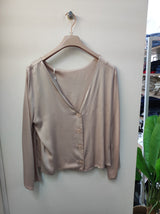 Blusa bottoni dietro cipria