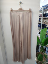 Pantalone midi largo in fondo rosa